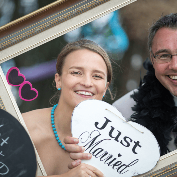 couple holding a 'just married' sign