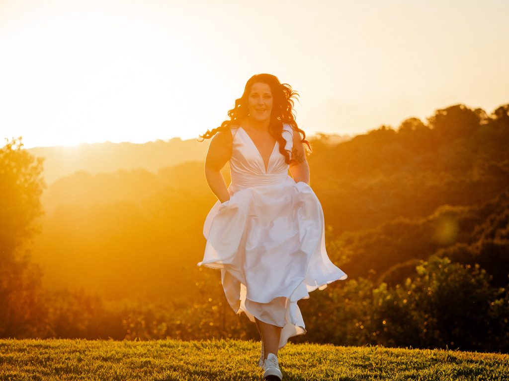 Bride running towards camera
